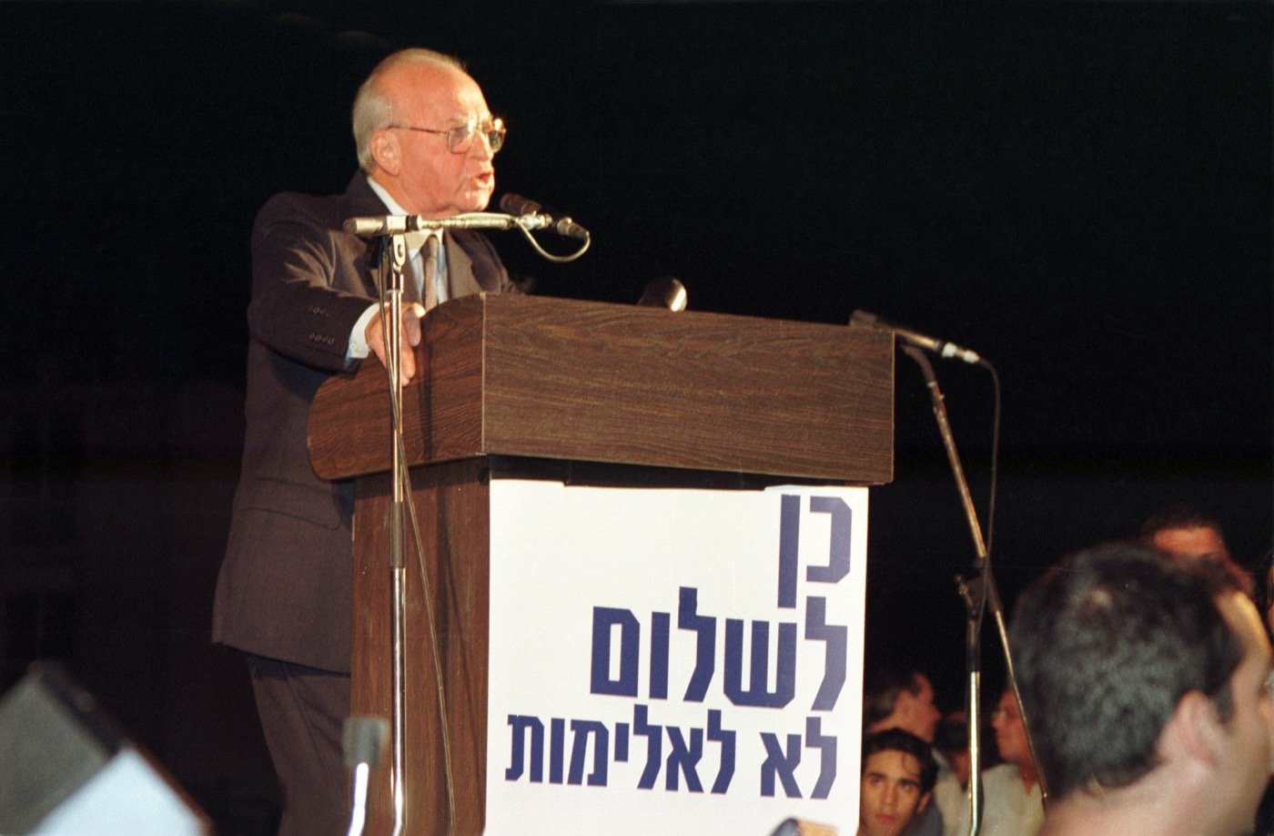 Rabin addressing the peace rally in the Tel Aviv municipality plaza, 4 November 1995. He was shot on his way home from this stage. (from Wikipedia; Dan Hadani Archive, National Library of Israel)