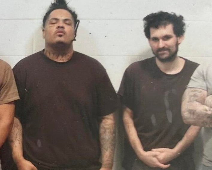 Sam Bankman-Fried (right) inside MDC Brooklyn, December 2023 (from Wikipedia)