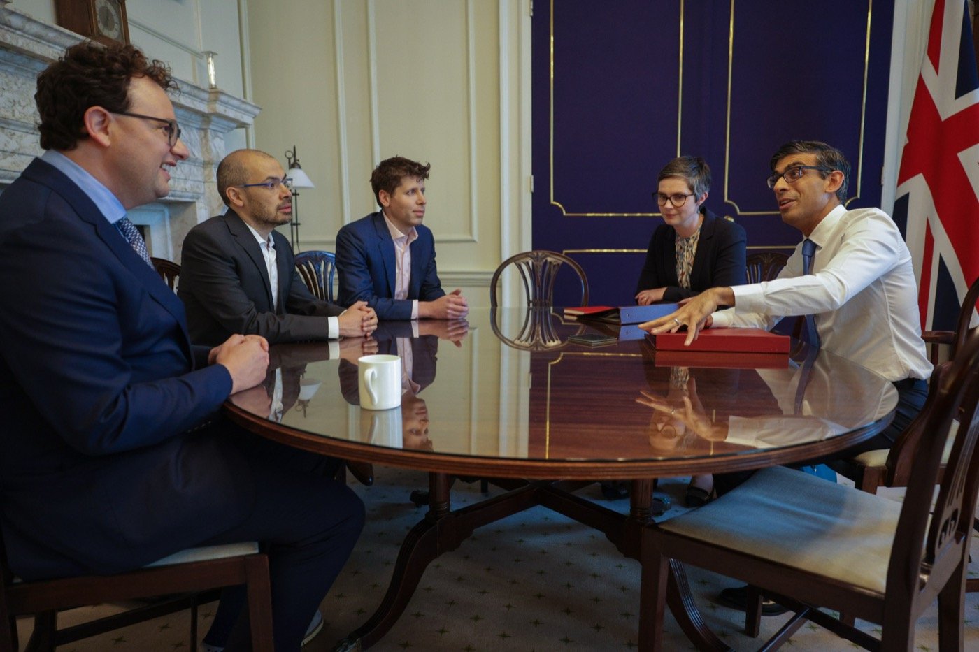 Rishi Sunak meets Dario Amodei, Demis Hassabis, and Sam Altman (left to right) at 10 Downing Street to discuss AI risk, May 2023 (from Wikipedia)