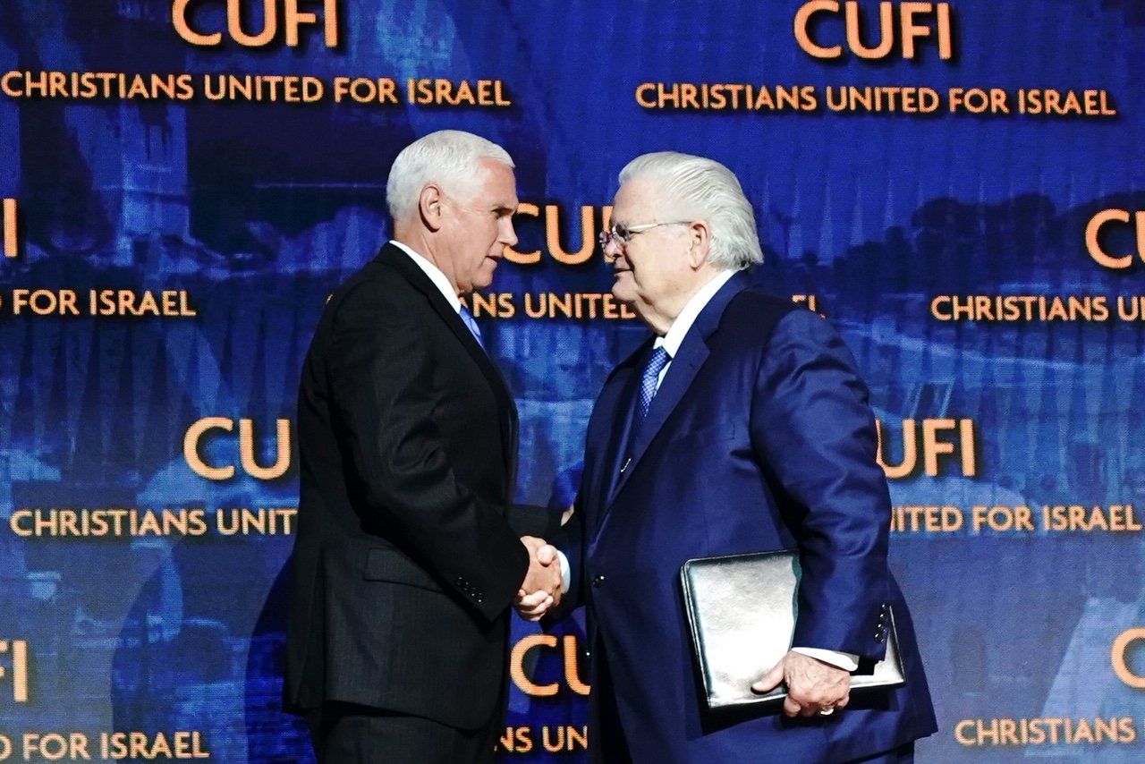 Mike Pence shakes hands with pastor John Hagee at the 2019 Christians United for Israel summit (from Wikipedia)