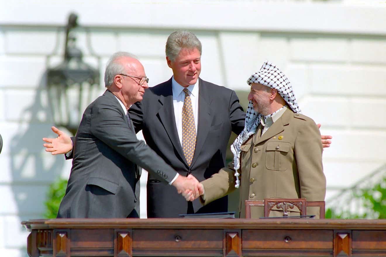Yitzhak Rabin, Bill Clinton and Yasser Arafat at the White House, 13 September 1993 (from Wikipedia; photo by Vince Musi / The White House)