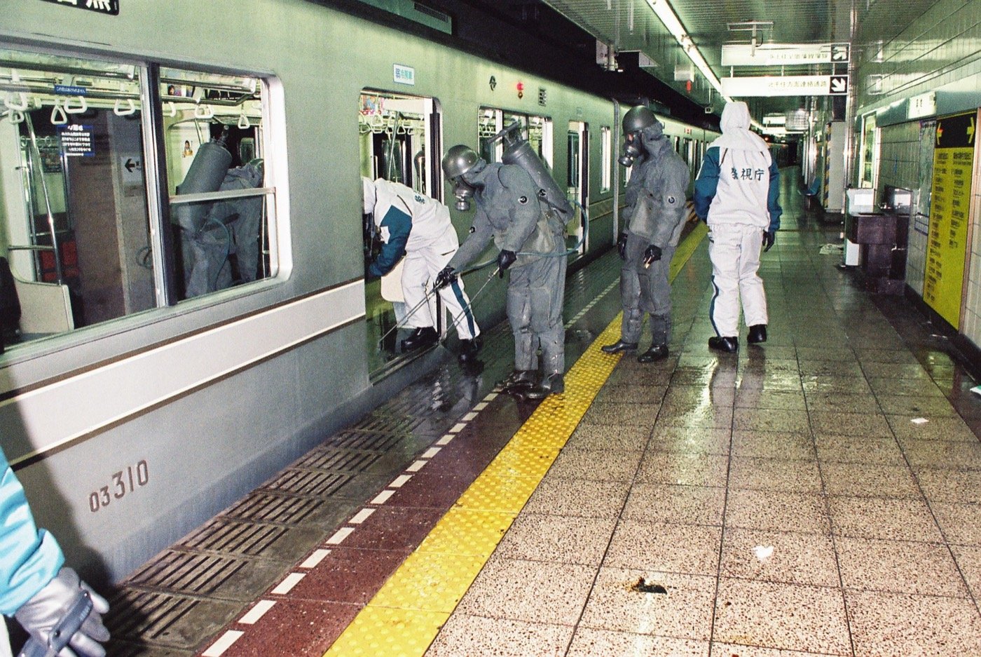 Japanese troops and police decontaminate a subway exit after the 1995 Tokyo sarin attack (from Wikipedia)